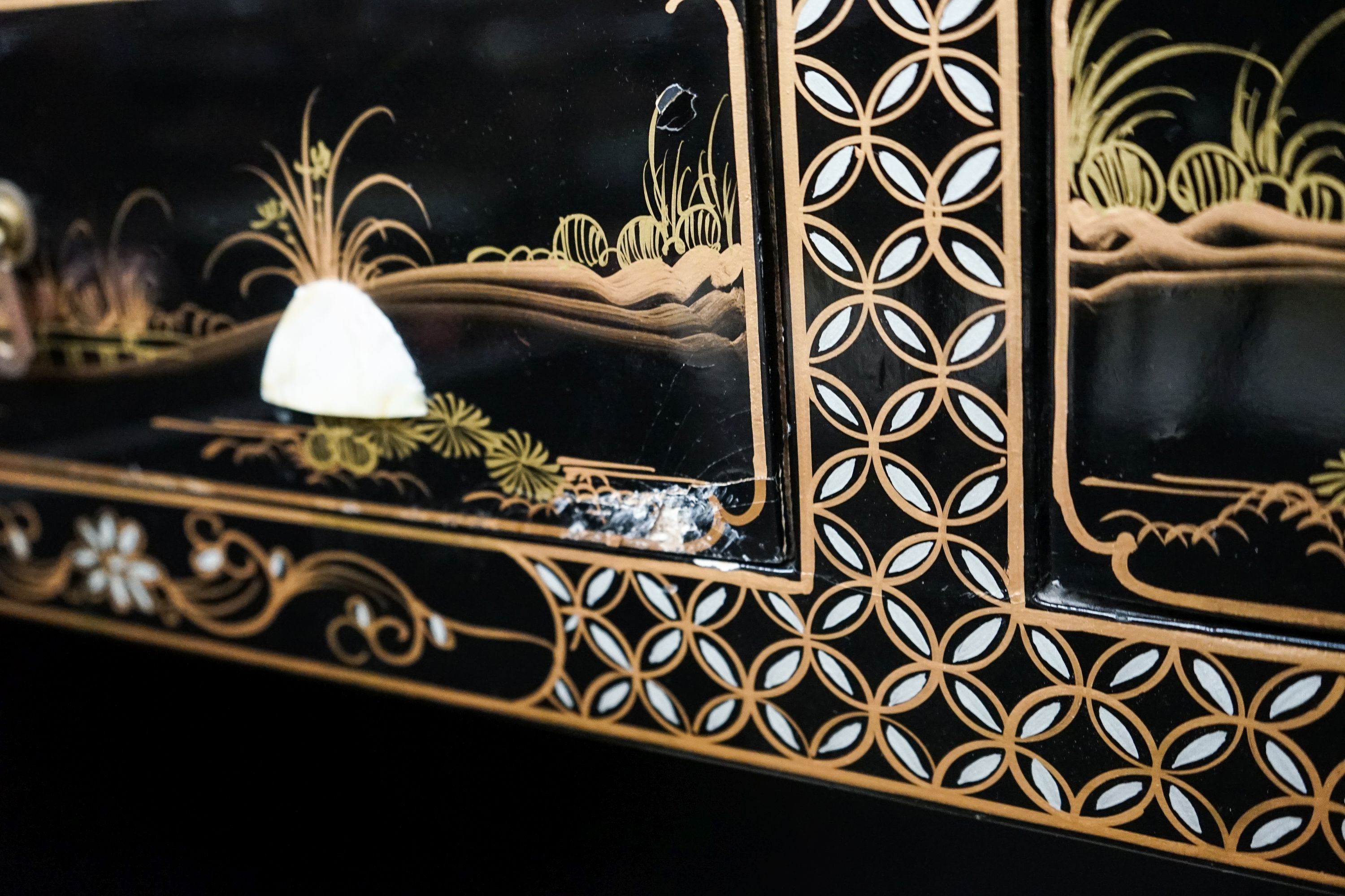 A Chinese style chinoiserie lacquer display cabinet with faux hardstone decoration, width 95cm, depth 38cm, height 183cm